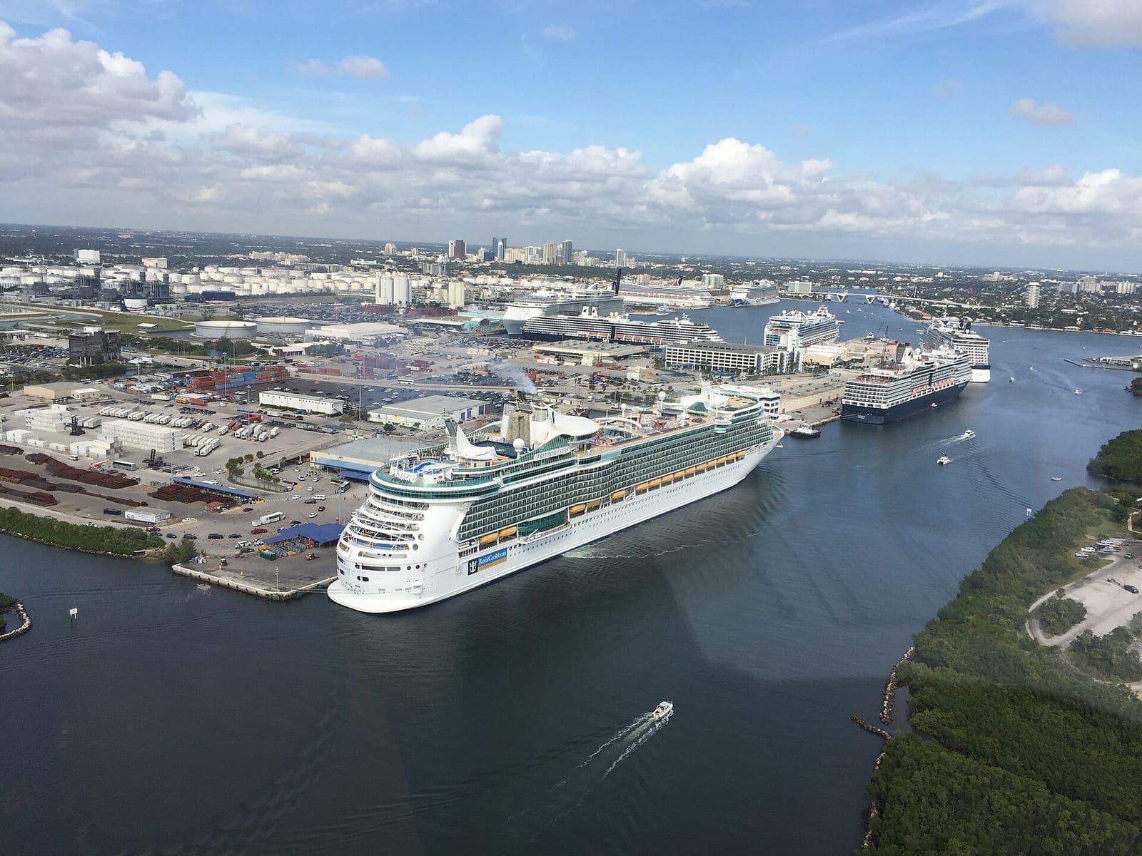 A cruise ship arriving at Port Everglades beside the city of Fort Lauderdale