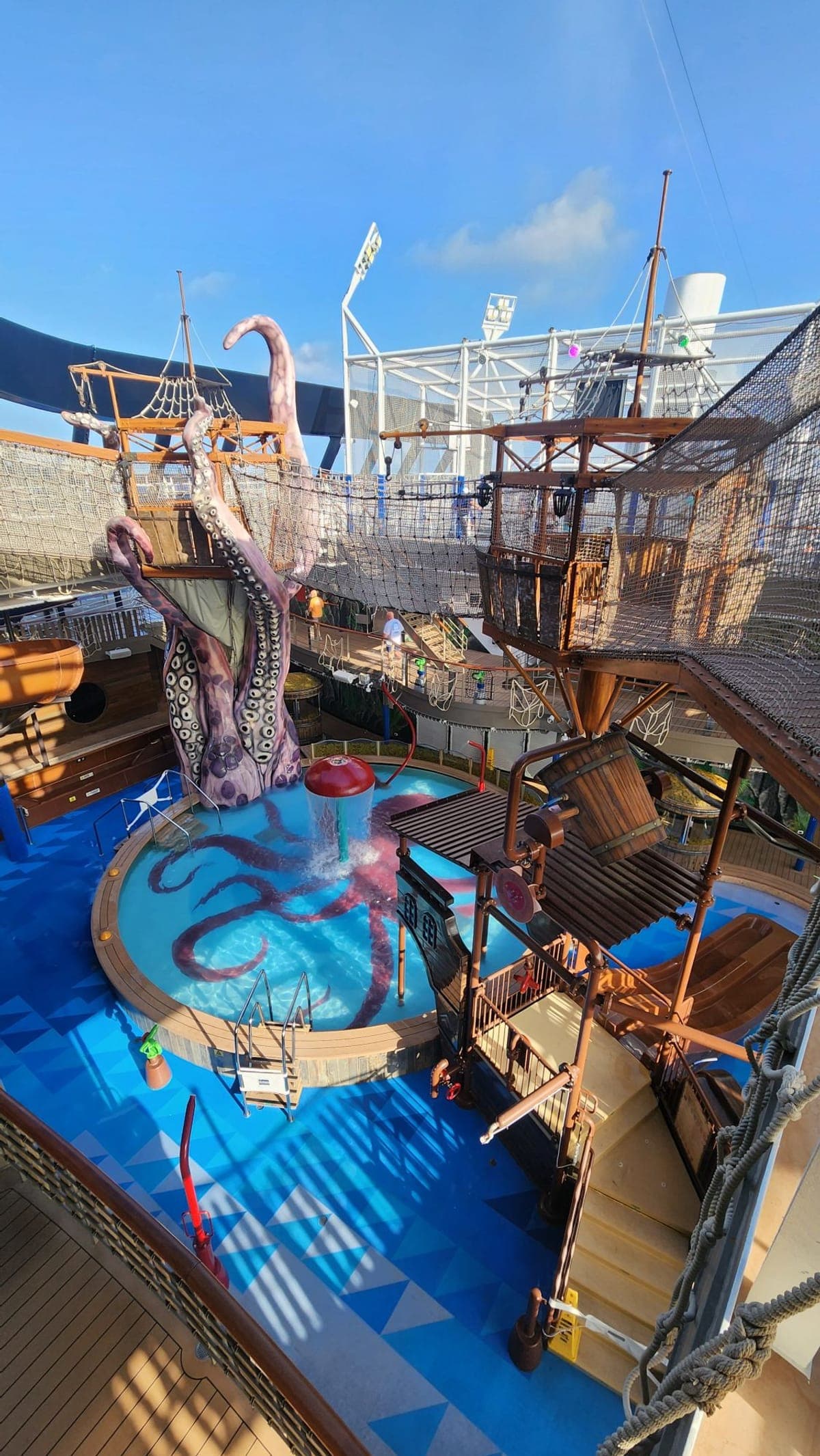 MSC Seashore's Aqua Park with an octopus-themed water play structure, slides, and a ropes course